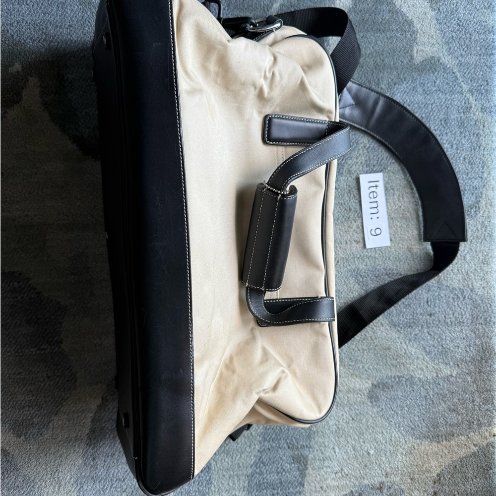 Coach Black and Cream Duffel Bags